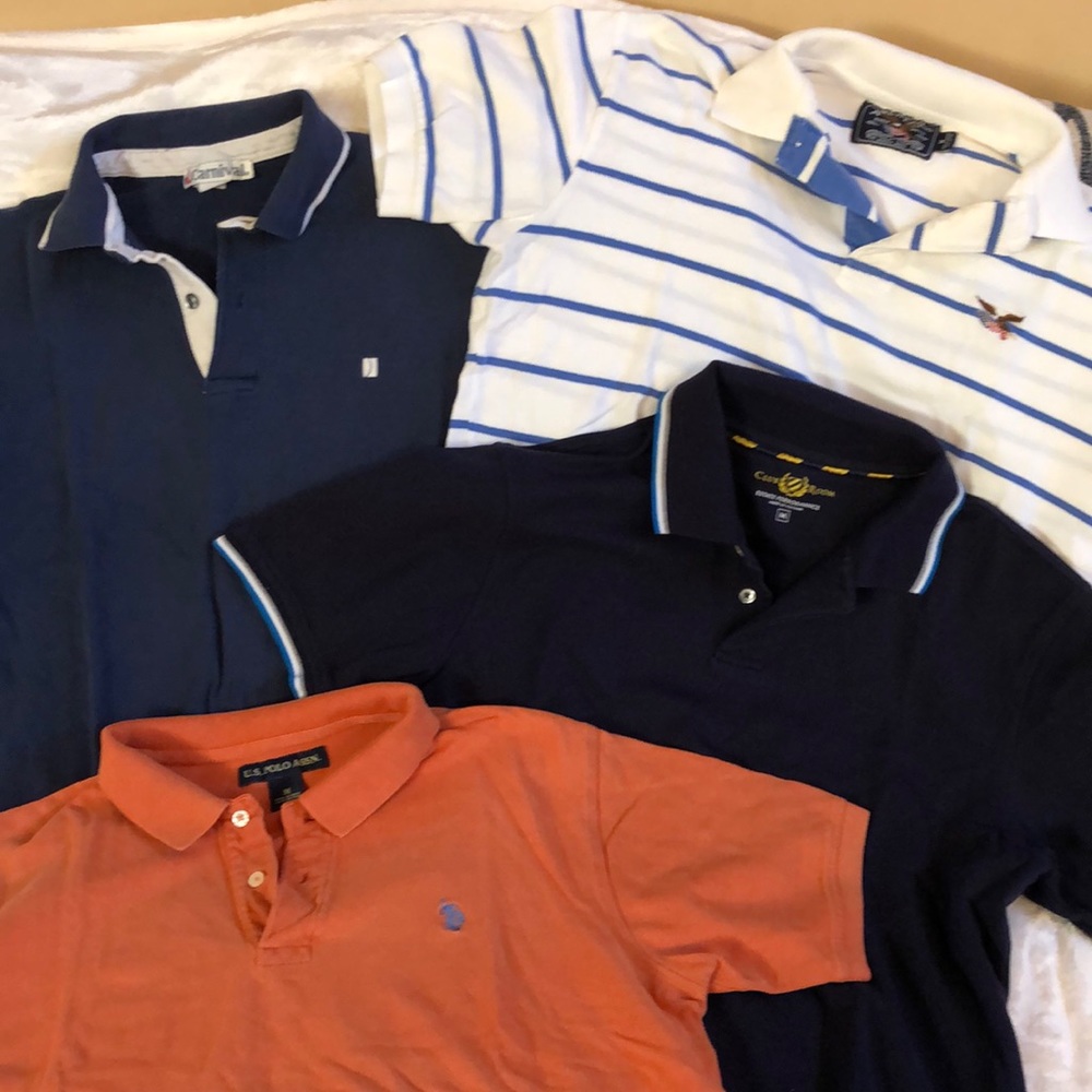 Four men’s polo shirts. Short sleeve